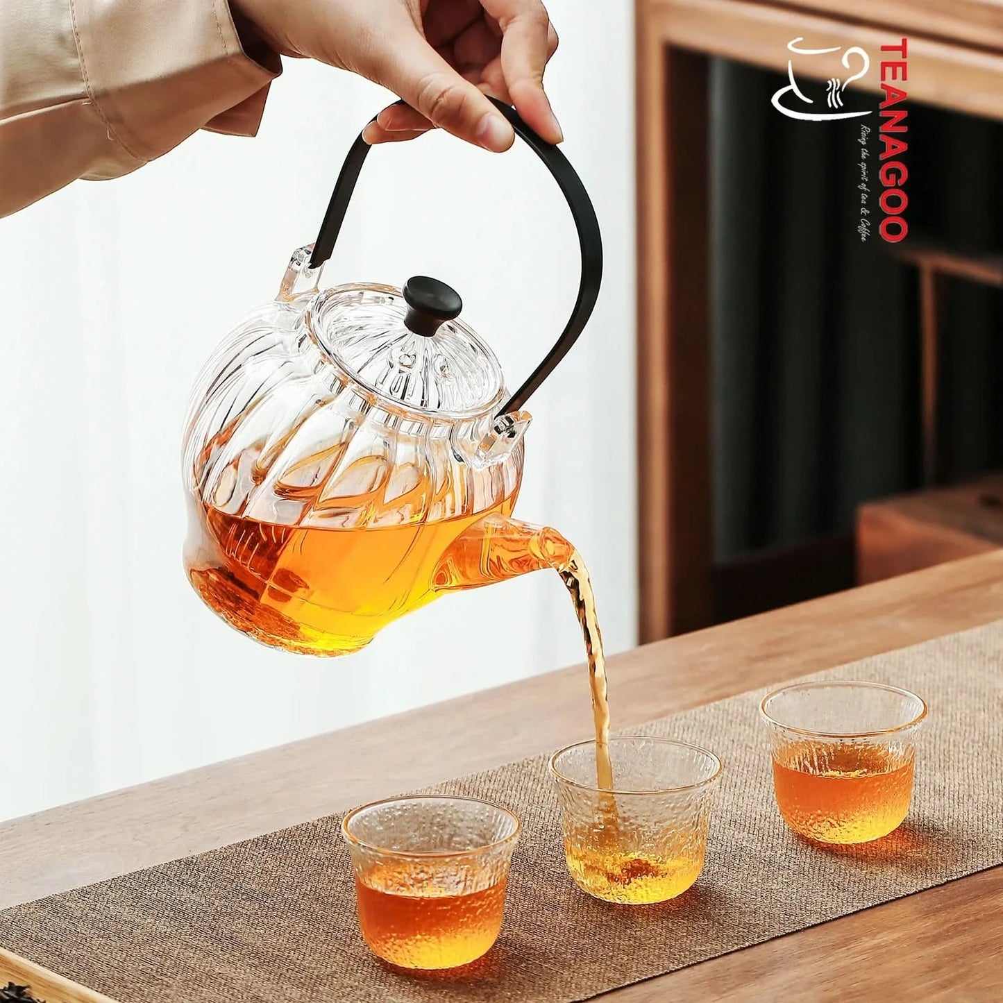 Pyrex teapot with glass infuser safe on stovetop to brew tea