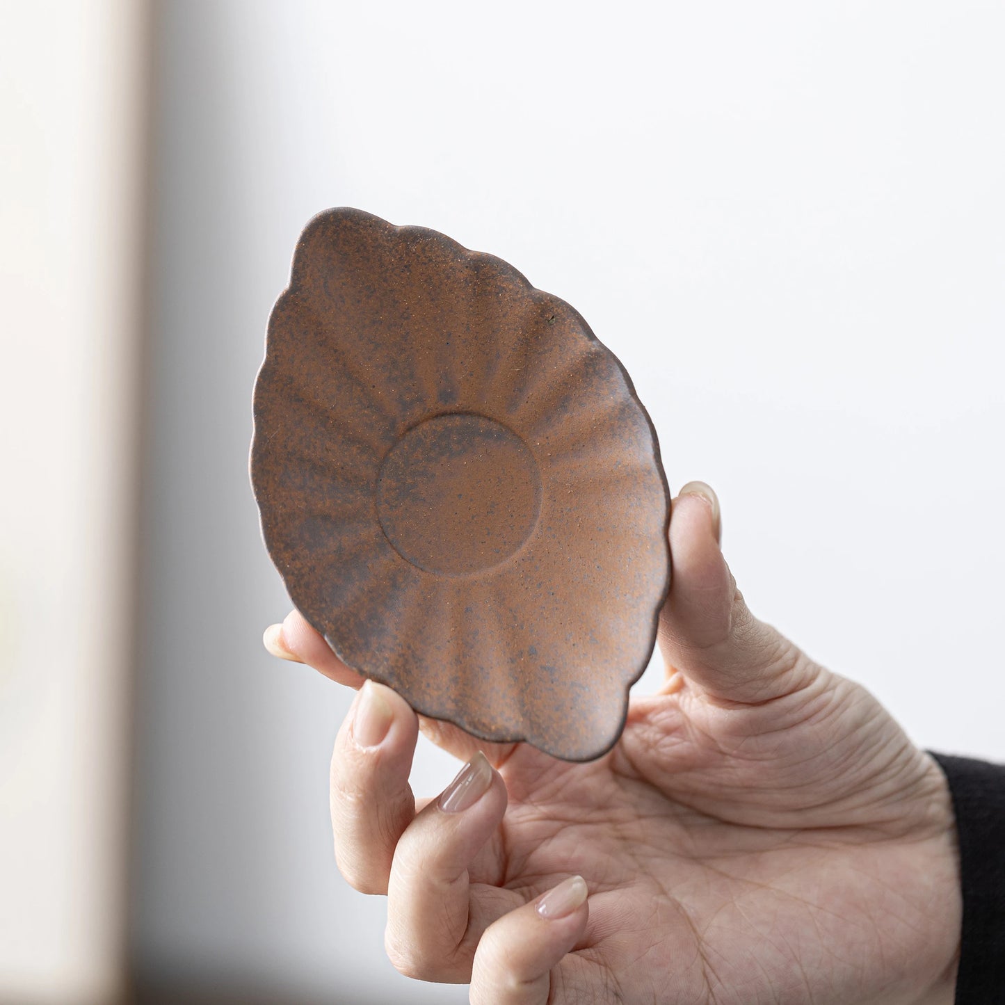 Posavasos de arcilla con forma de hoja