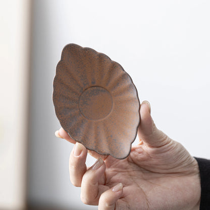 Posavasos de arcilla con forma de hoja