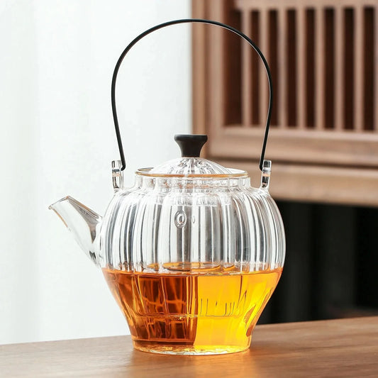 Pyrex teapot with glass infuser safe on stovetop to brew tea