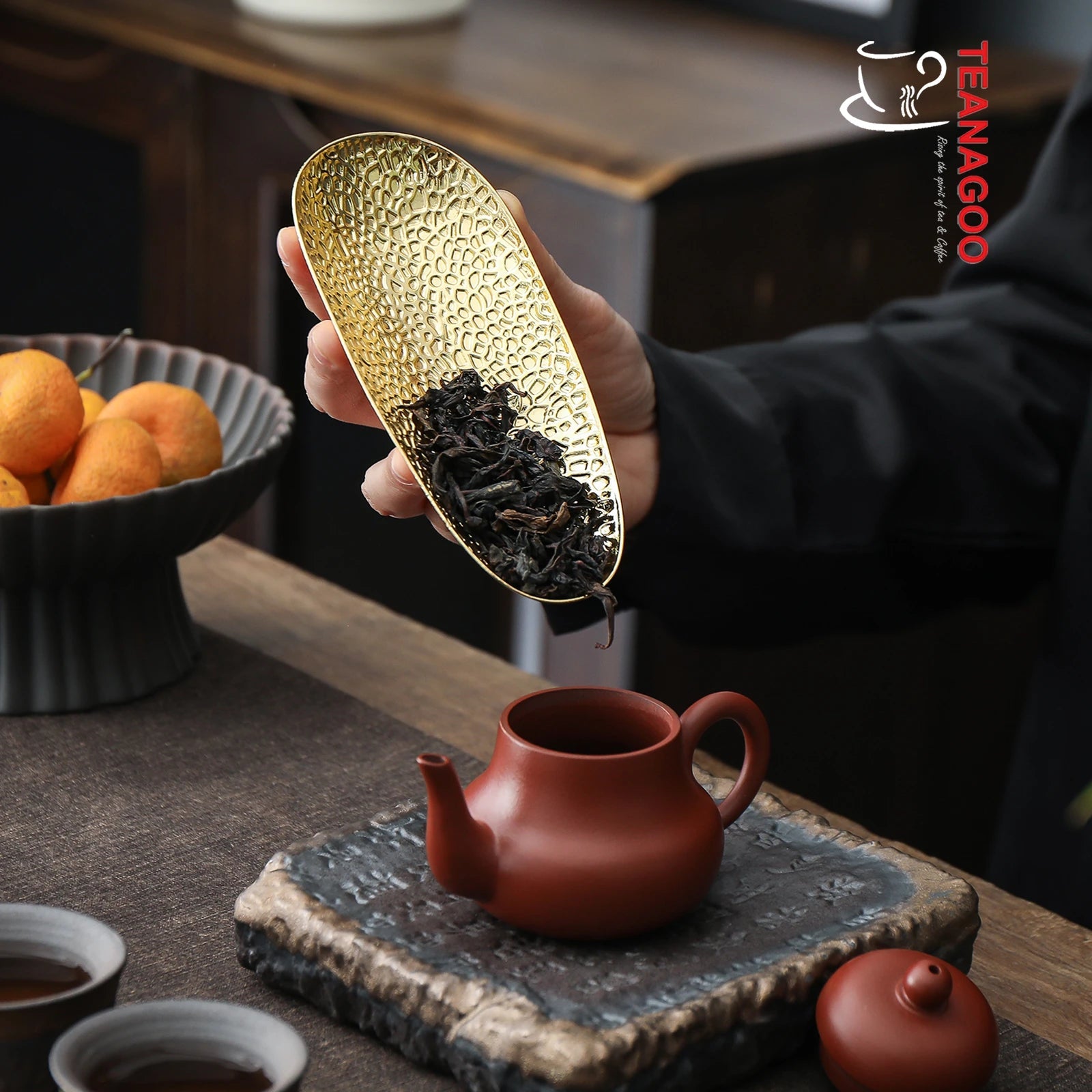 https://www.teanagoo.com/cdn/shop/products/Embossing_Lotus_Leaf_Alloy_Copper_Cha_He_Tea_Holder_Handmade_Tea_Accessories_CH05-02.jpg?v=1668581859&width=1946