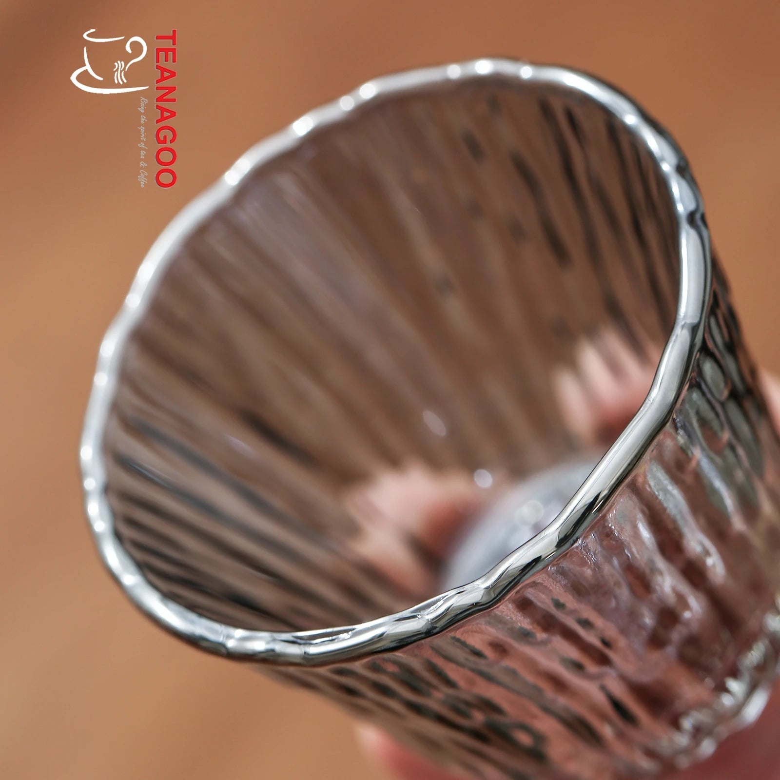 https://www.teanagoo.com/cdn/shop/products/Heat_Resistant_Glass_Tea_Cup_Handmade_Gongfu_Teaware_CUP_13-3.jpg?v=1672022912&width=1946